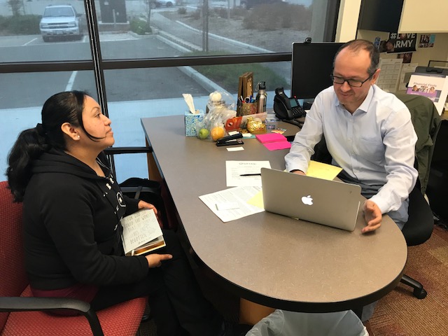 A woman receiving financial counseling