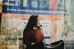 Woman speaks w/mission stmt