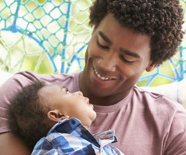 father and baby gazing at one another adoringly