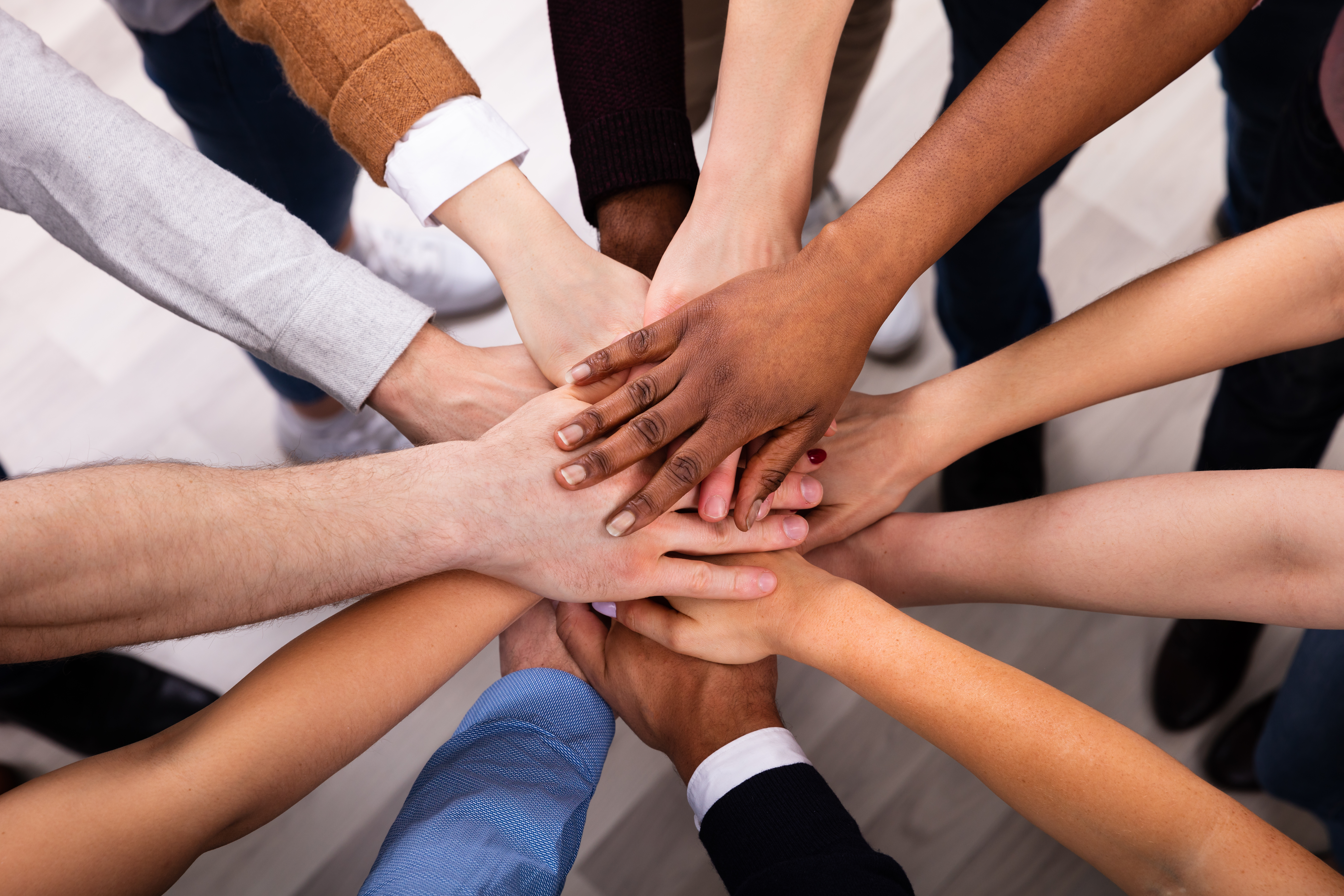 diverse stacking of hands