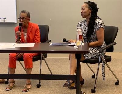 Andrea Harris - Lois D Andrea Harris (left) and Lois Deloatch at a Self-Help Credit Union "Lunch 'n Learn"