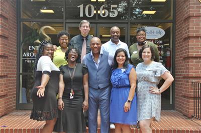 Charlotte GrOp-grouplaugh Self-Help CU staff pose in front of new Charlotte, NC branch.