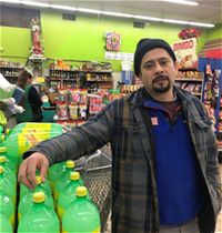 Homero Pina Homero Pina, grocer on the South Side of Chicago