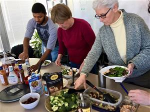 Salad Day Jan 2019 - 1 Self-Help staffers at pot luck salad bar