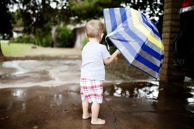 Small child with umbrella