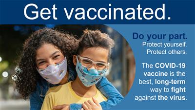 Two people who have received a COVID vaccine