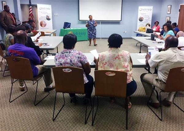Wilson-mortgageworkshop Self-Help staff lead a home buyers' workshop in Wilson, NC